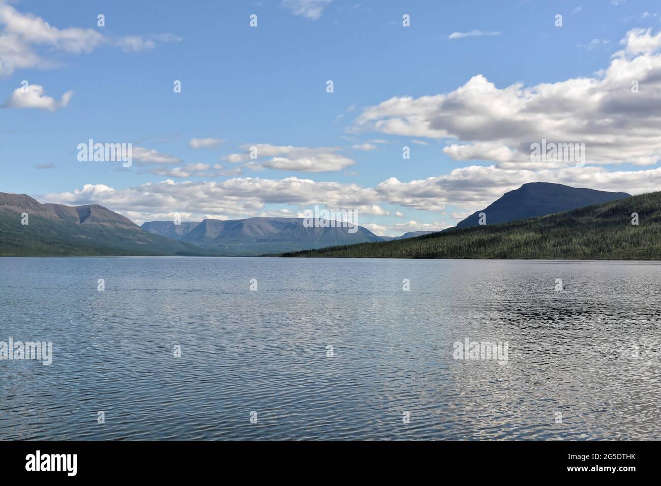 Lake on the Putorana plateau. Water landscape of the Taimyr Peninsula in the north of the Krasnoyarsk Territory. Siberia, Russia. Stock Photo