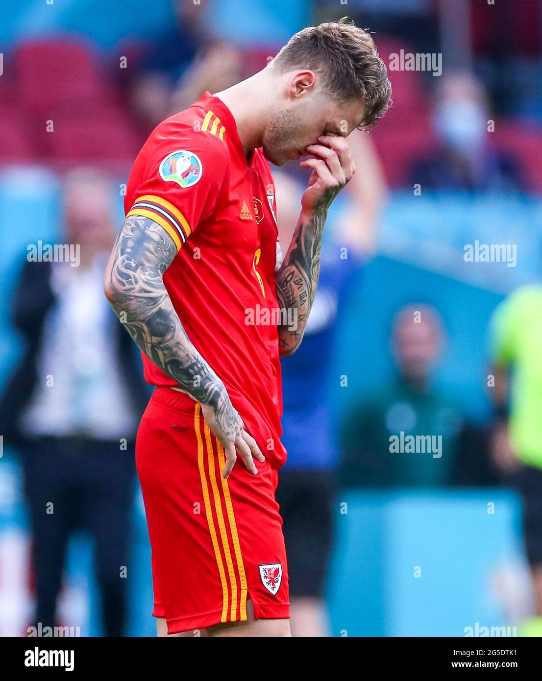 Wales' Joe Rodon appears dejected after the final whistle during the UEFA Euro 2020 round of 16 match held at the Johan Cruijff ArenA in Amsterdam, Netherlands. Picture date: Saturday June 26, 2021. Stock Photo