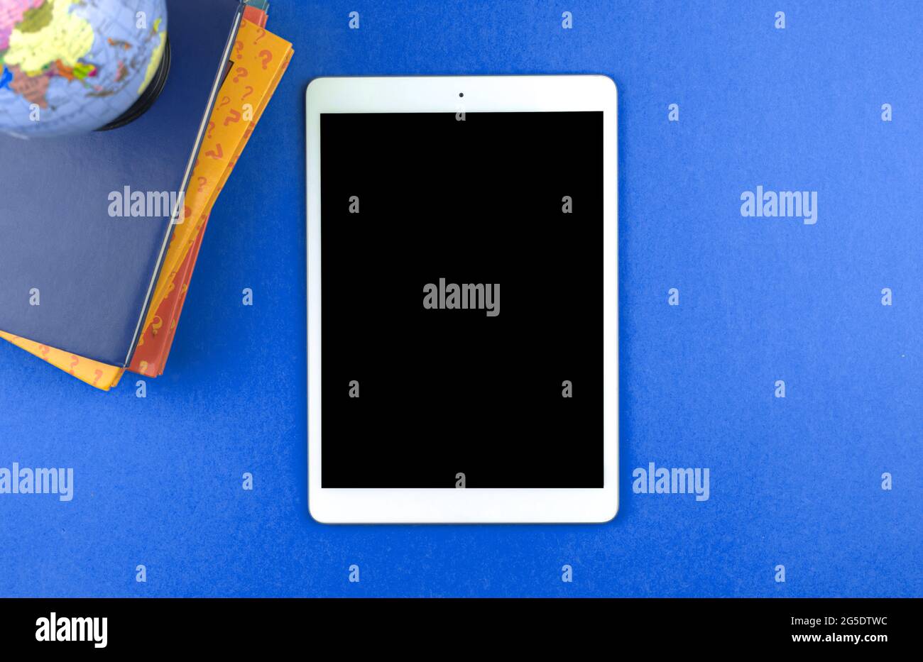 Education with digital tablet, new normal concept, empry screen mockup, flat lay school composition, top view Stock Photo