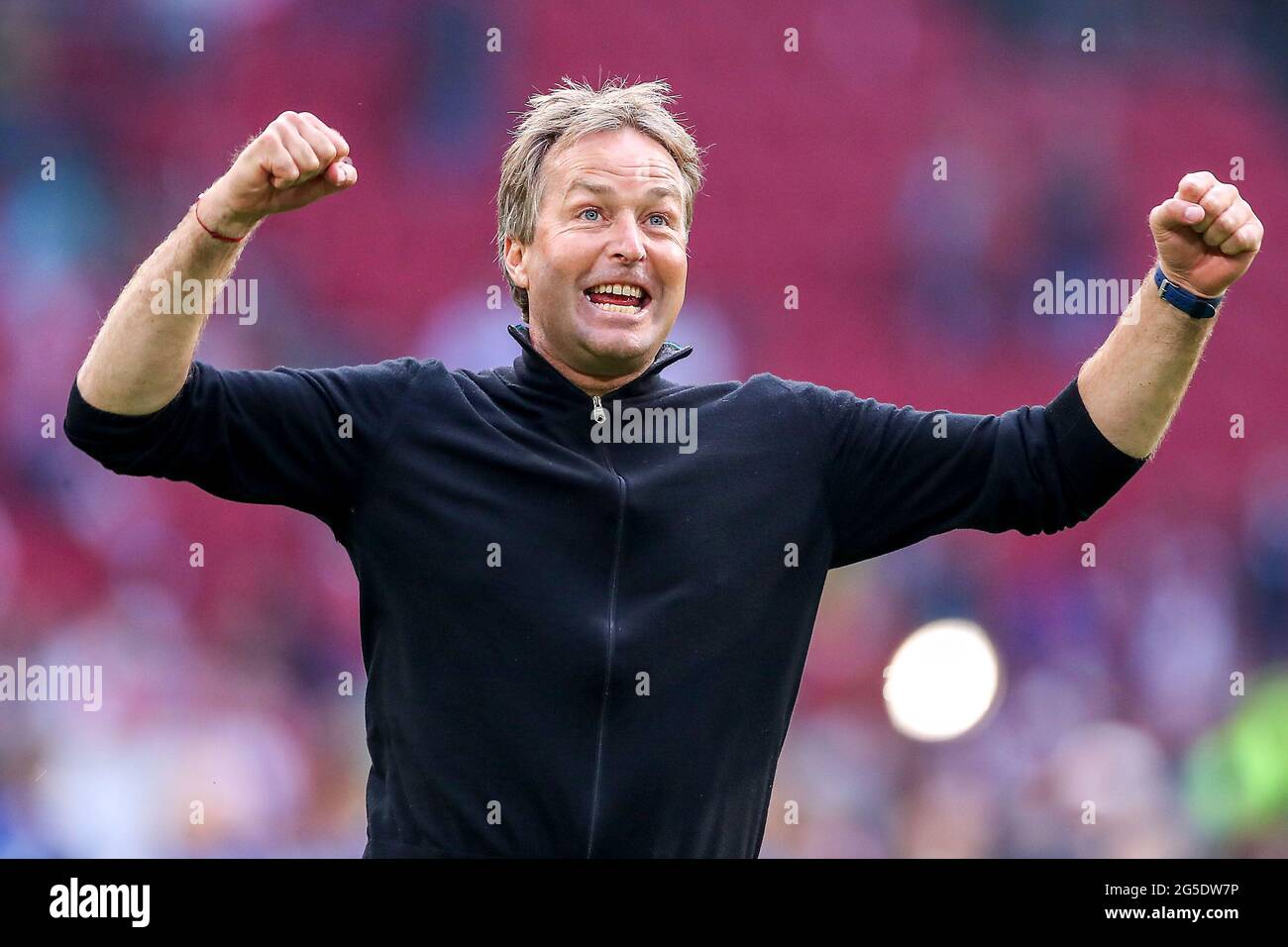 Denmark manager Kasper Hjulmand celebrates victory after the final whistle during the UEFA Euro 2020 round of 16 match held at the Johan Cruijff ArenA in Amsterdam, Netherlands. Picture date: Saturday June 26, 2021. Stock Photo