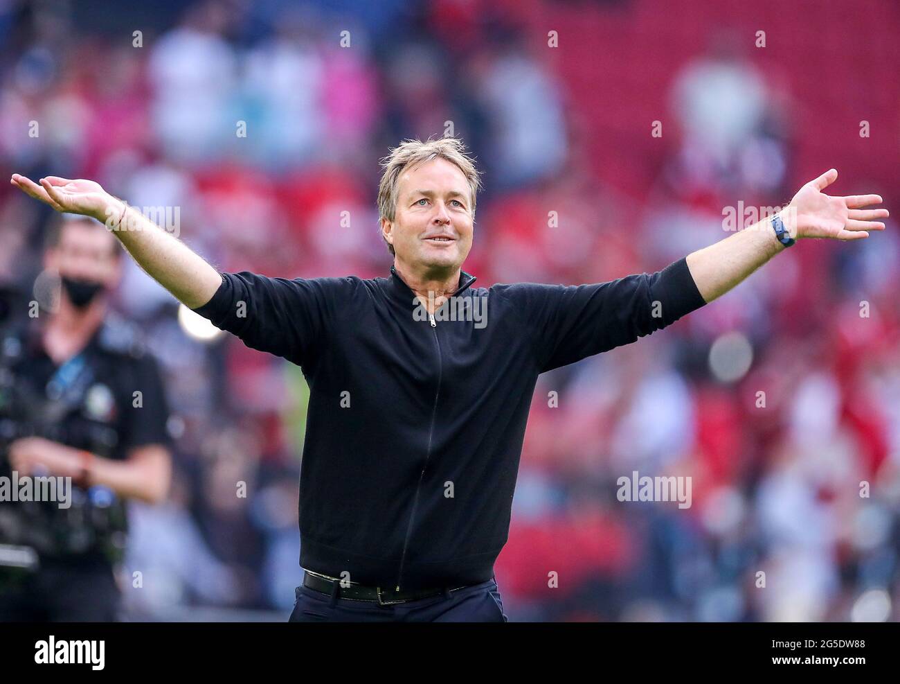 Denmark manager Kasper Hjulmand celebrates victory after the final whistle during the UEFA Euro 2020 round of 16 match held at the Johan Cruijff ArenA in Amsterdam, Netherlands. Picture date: Saturday June 26, 2021. Stock Photo