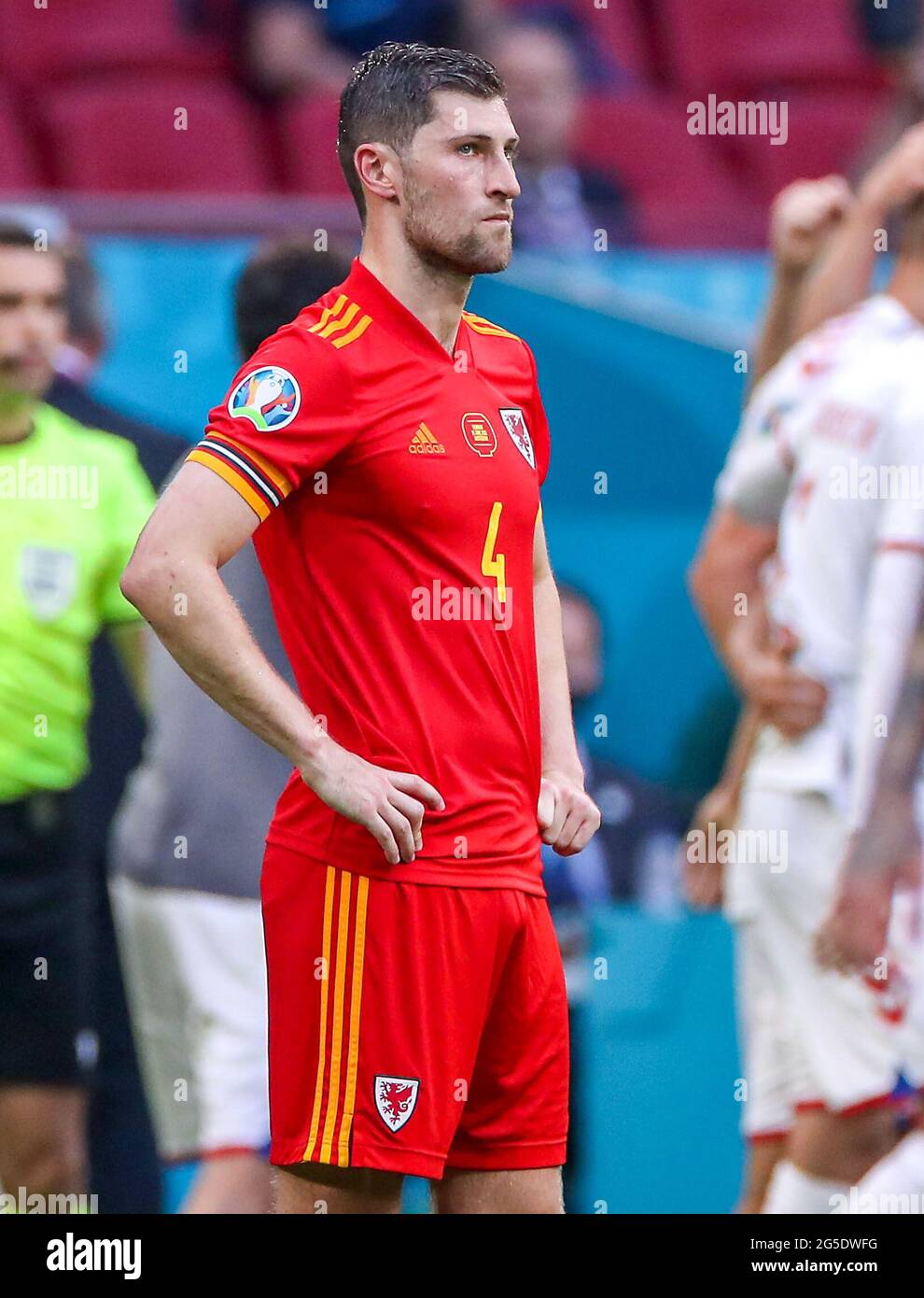 Wales' Ben Davies appears dejected after the final whistle during the UEFA Euro 2020 round of 16 match held at the Johan Cruijff ArenA in Amsterdam, Netherlands. Picture date: Saturday June 26, 2021. Stock Photo