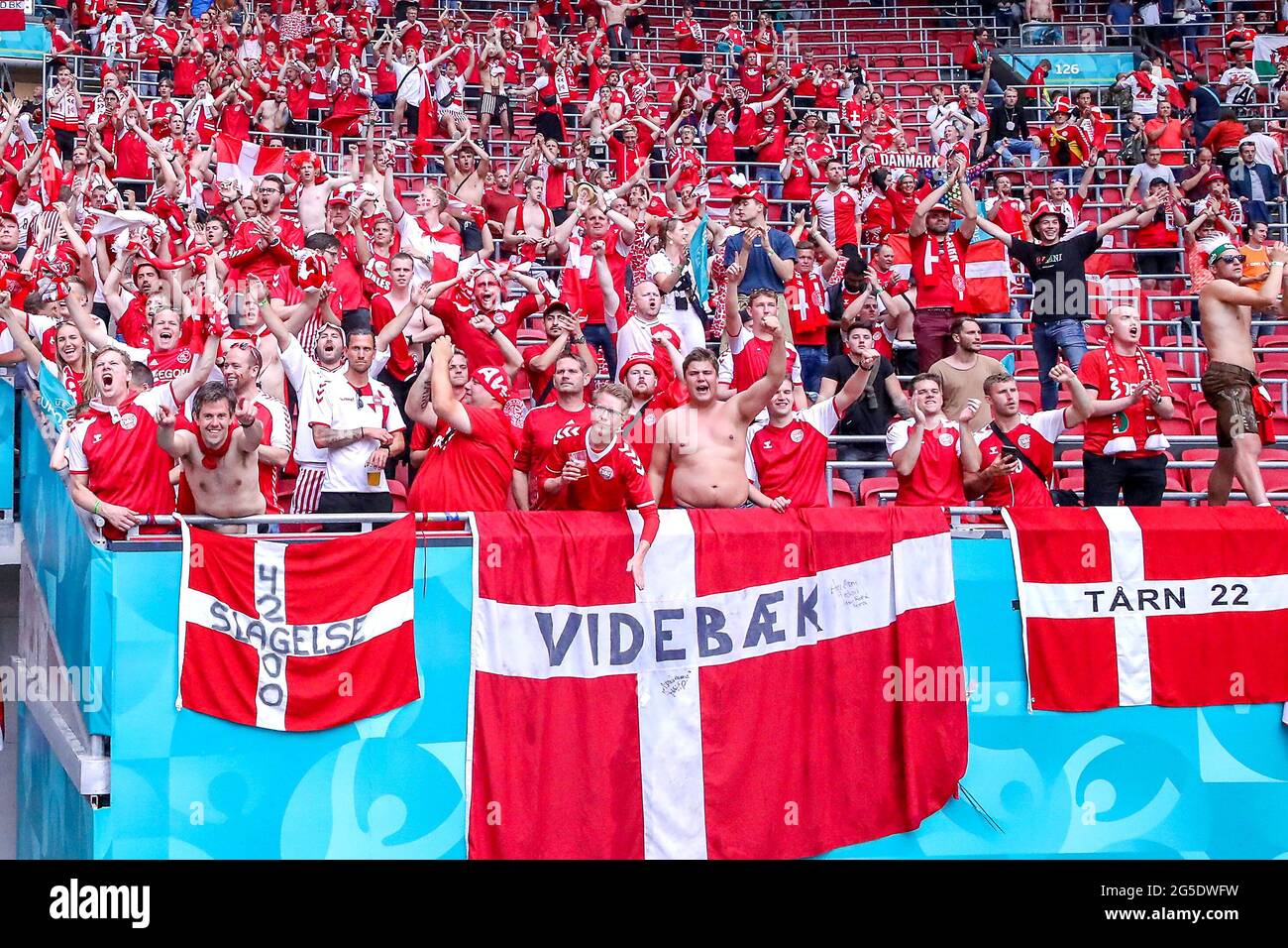 Denmark fans celebrate victory after the final whistle during the UEFA Euro 2020 round of 16 match held at the Johan Cruijff ArenA in Amsterdam, Netherlands. Picture date: Saturday June 26, 2021. Stock Photo
