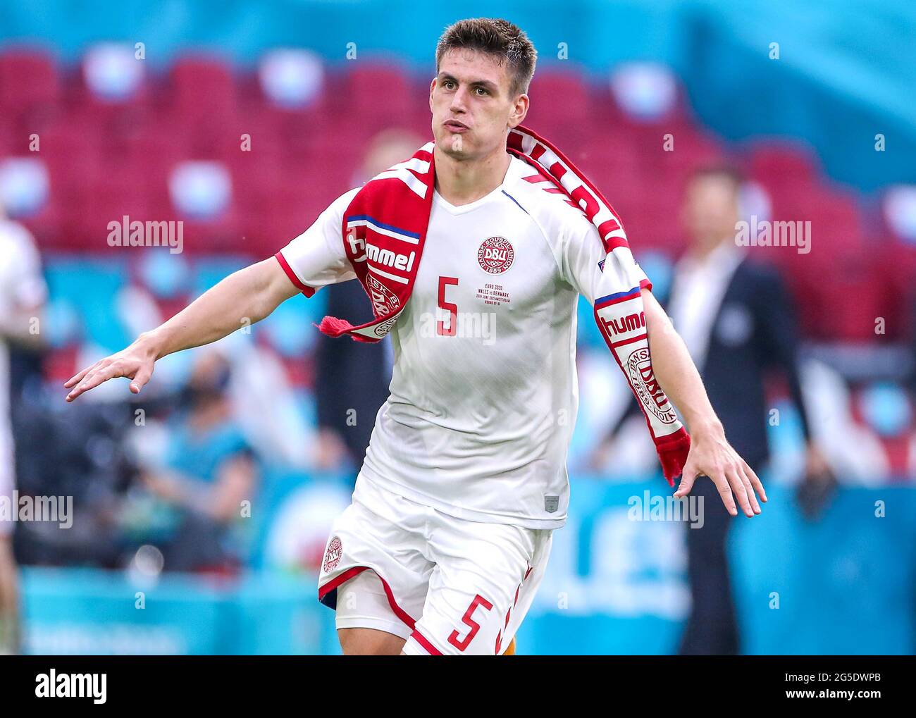 Denmark's Joakim Maehle celebrates victory after the final whistle during the UEFA Euro 2020 round of 16 match held at the Johan Cruijff ArenA in Amsterdam, Netherlands. Picture date: Saturday June 26, 2021. Stock Photo