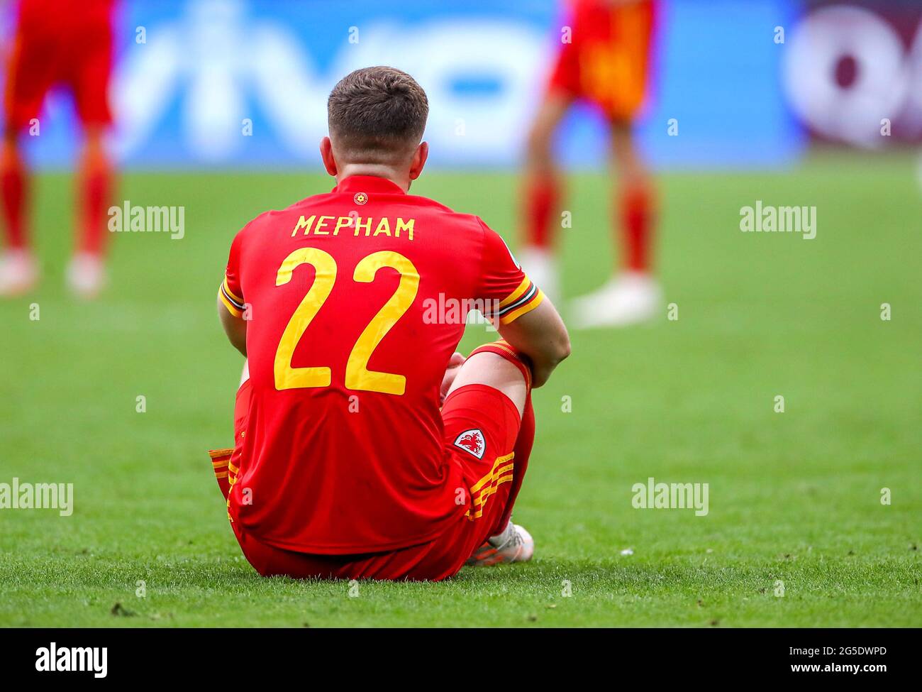 Wales' Chris Mepham appears dejected after the final whistle during the UEFA Euro 2020 round of 16 match held at the Johan Cruijff ArenA in Amsterdam, Netherlands. Picture date: Saturday June 26, 2021. Stock Photo