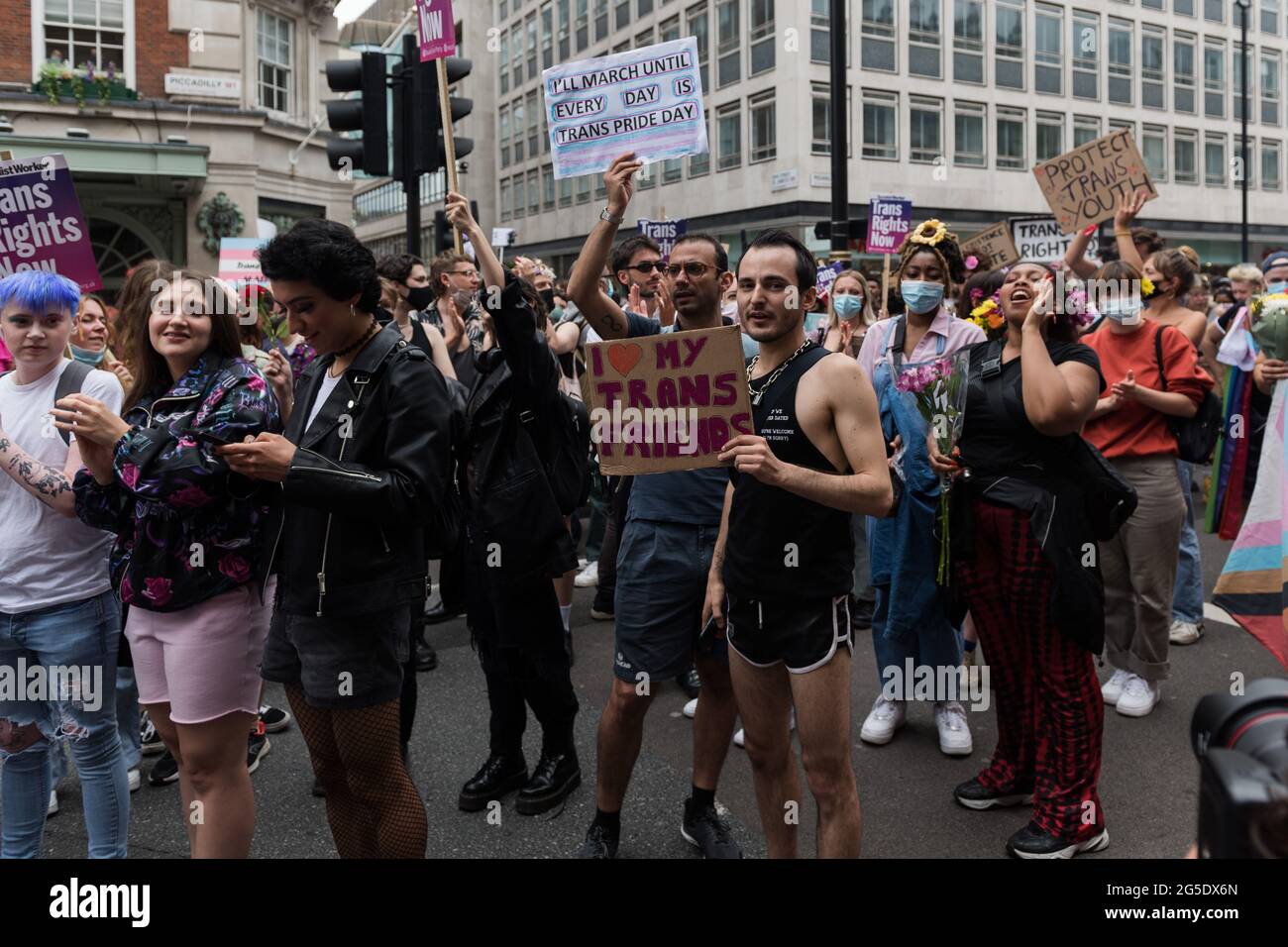 London, UK. 26th June, 2021. Transgender people and their supporters march through central London during the third Trans Pride protest march for equality. Protesters demand investment in trans healthcare, accessible bathroom provisions and prison facilities, an end to non-consensual surgeries on intersex children and ban on pseudoscientific conversion therapies. Credit: Wiktor Szymanowicz/Alamy Live News Stock Photo