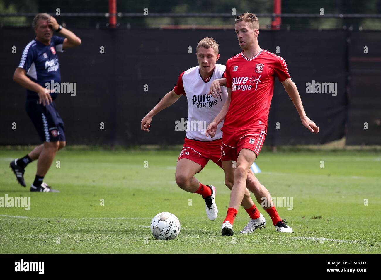 HENGELO, NETHERLANDS - JUNE 26: Jesse Bosch of FC Twente and Gijs Smal of FC Twente during the first Training Session of FC Twente of season 2021-2022 at Trainingscentrum Hengelo on June 26, 2021 in Hengelo, Netherlands. (Photo by Marcel ter Bals/Orange Pictures) Stock Photo