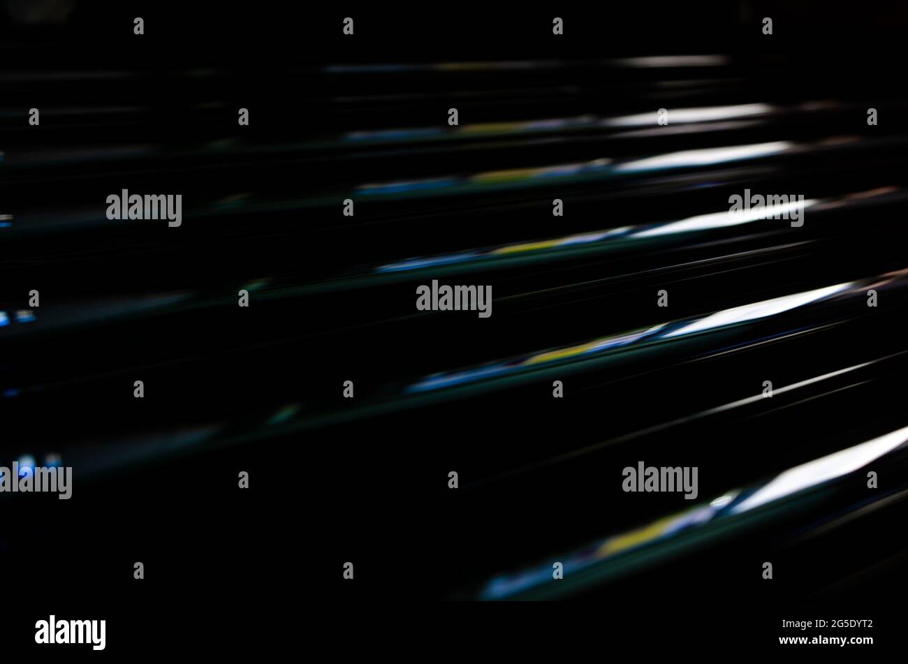 abstract dark black background with shiny metallic lines pattern Stock Photo