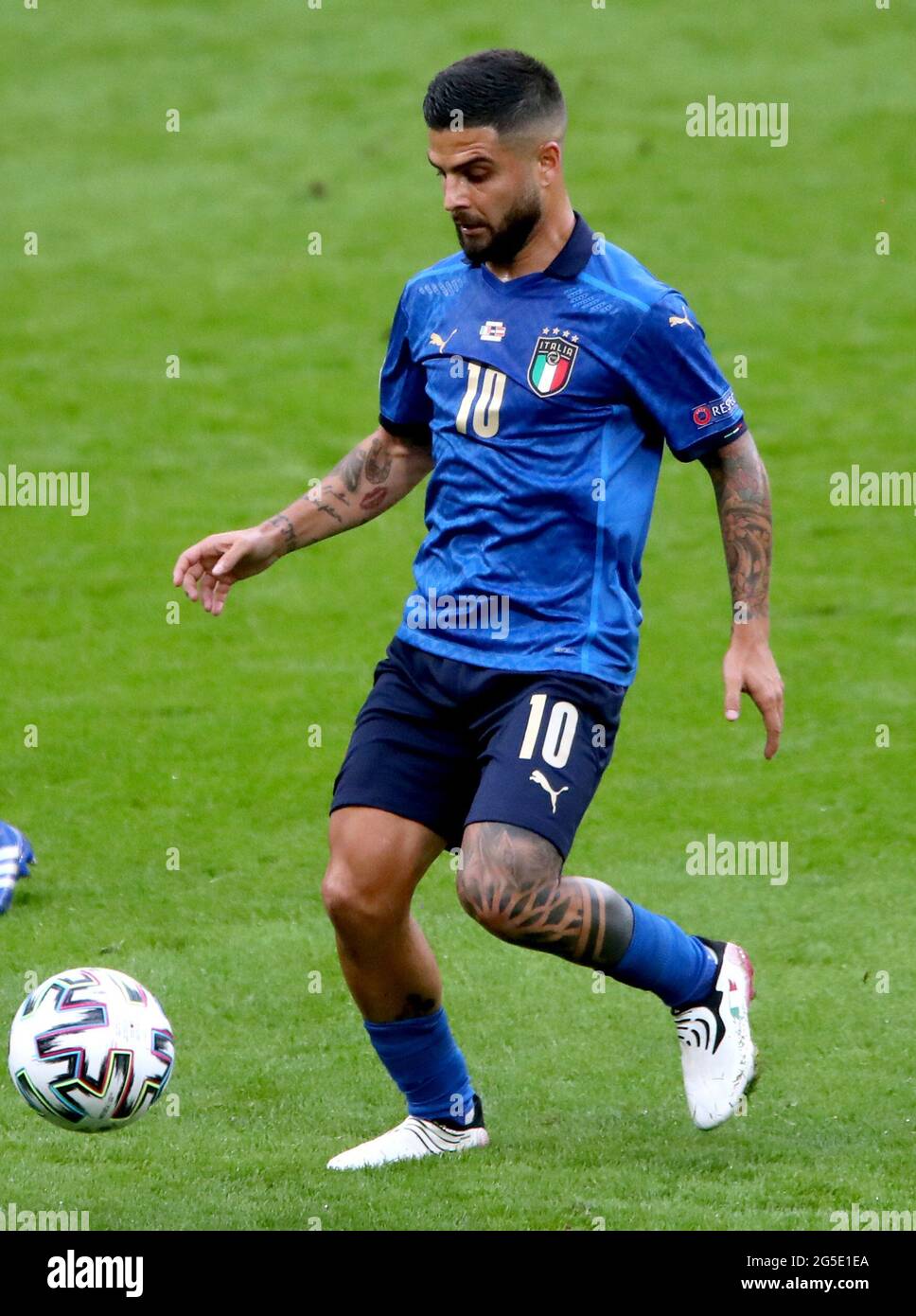 Italy's Lorenzo Insigne (right) and Austria's Stefan Lainer battle for the ball during the UEFA Euro 2020 round of 16 match held at Wembley Stadium, London. Picture date: Saturday June 26, 2021. Stock Photo
