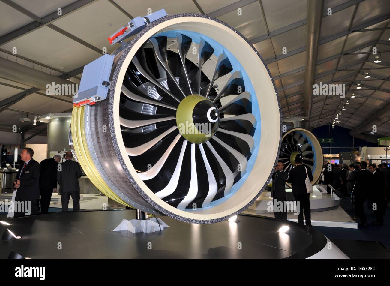CFM International LEAP high-bypass turbofan engine display stand at the Farnborough International Airshow trade fair 2012, UK. Busy hall with people Stock Photo