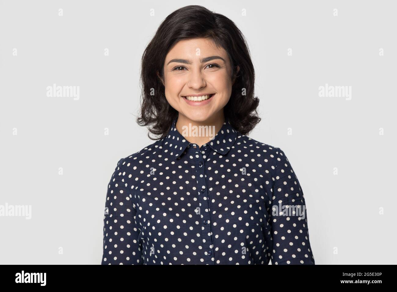 Headshot portrait of smiling Indian woman pose in studio Stock Photo ...