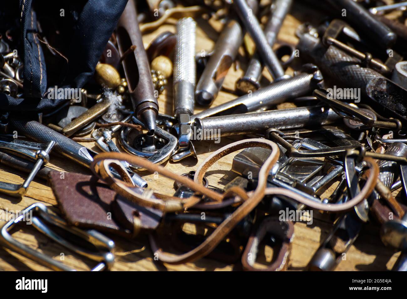 Bucharest, Romania - June 24, 2021: The leather tools of a traditional craftsman, at the Dimitrie Gusti National Village Museum, in Bucharest. Stock Photo