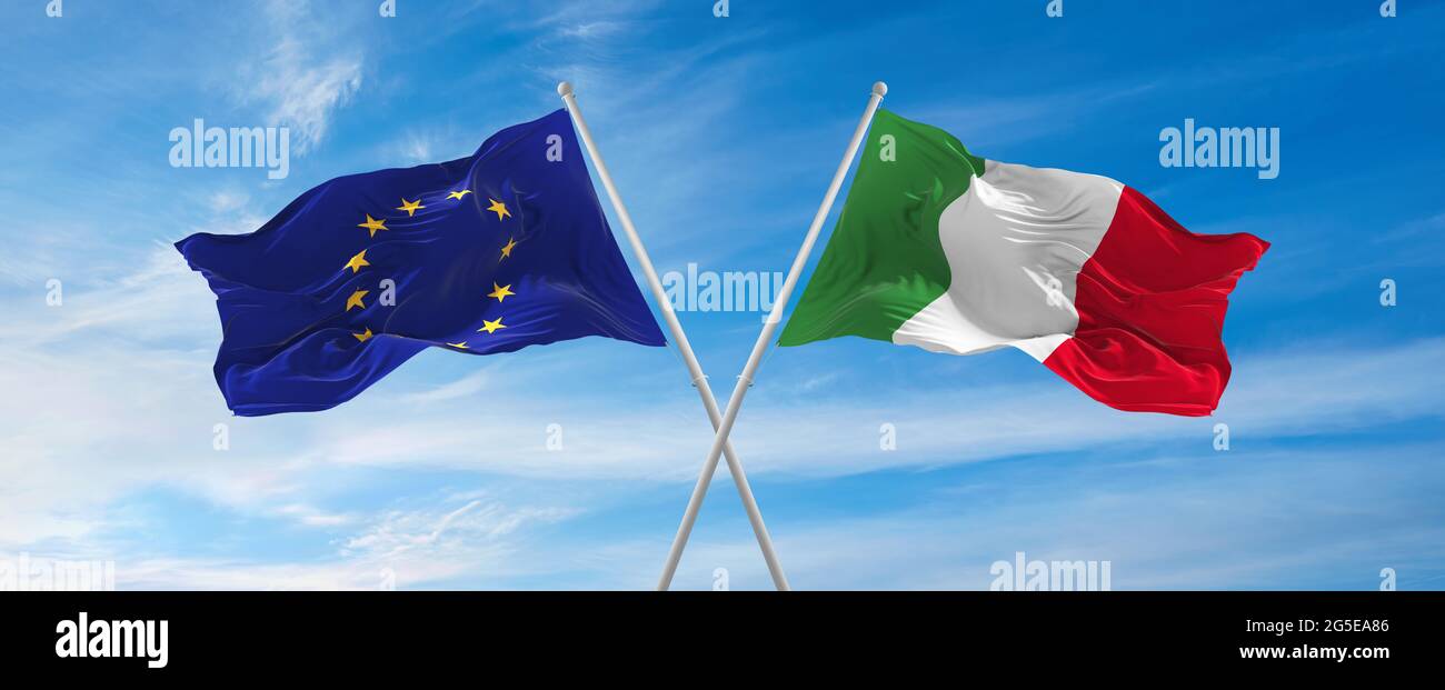 flags of European Union and Italia waving in the wind on flagpoles ...