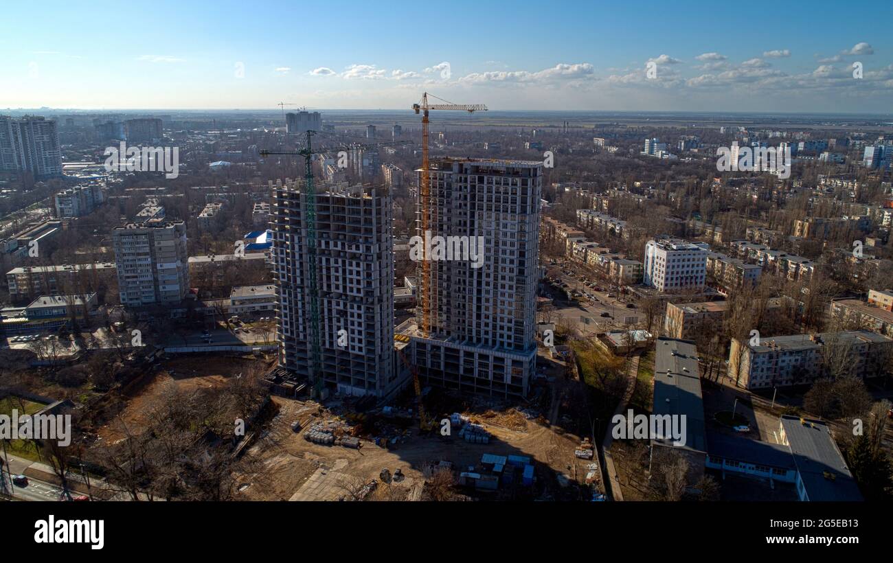 Construction of high-rise residential building. Aerial view of construction of high-rise apartment building. Stock Photo