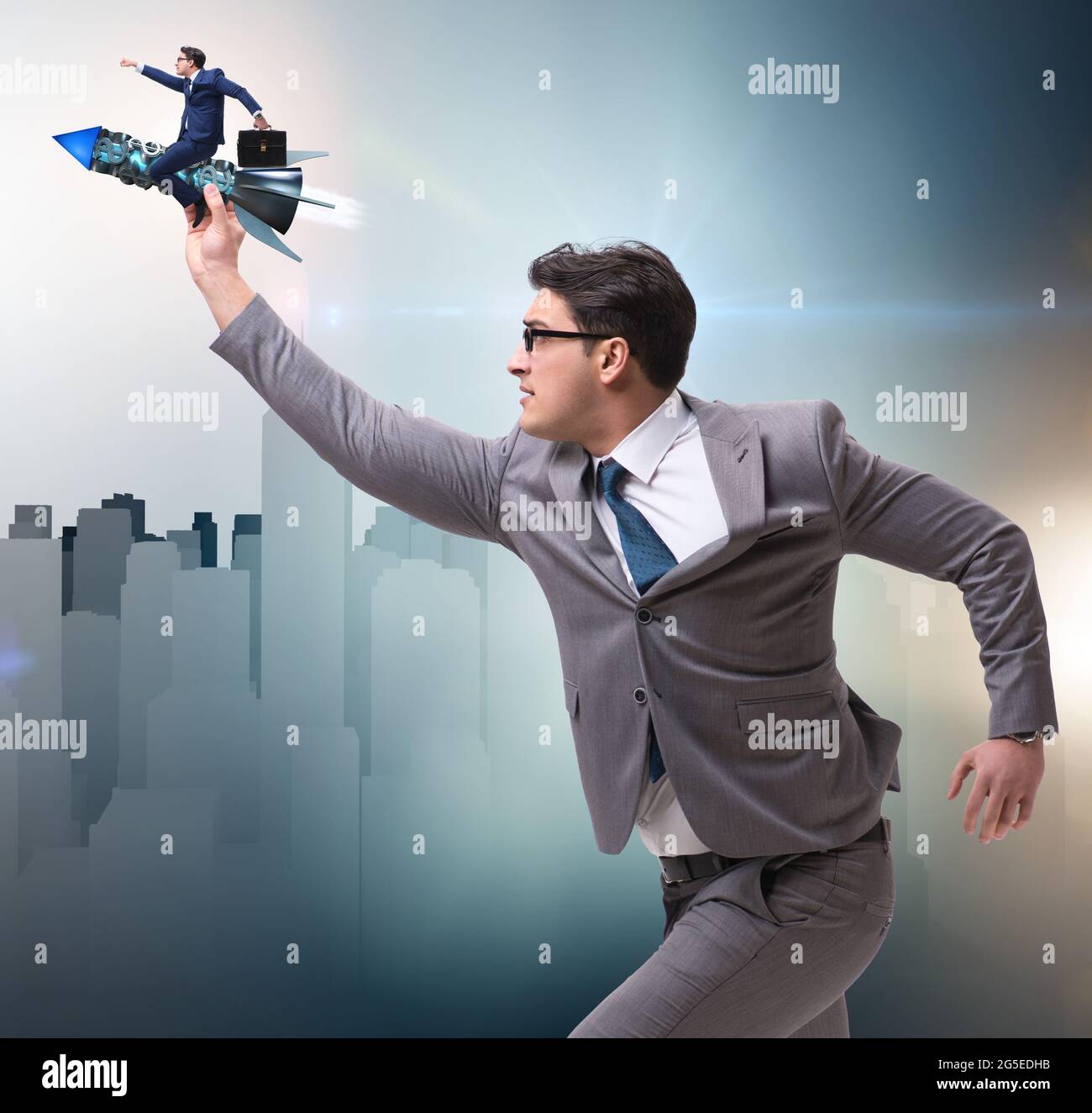 The businessman in start up business concept Stock Photo - Alamy