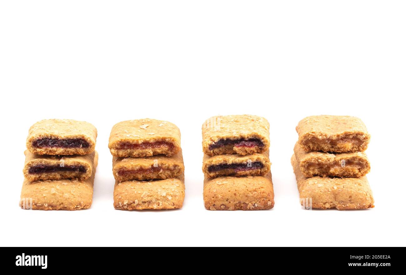 Various Flavors of Whole Grain Breakfast Bars on a White Background
