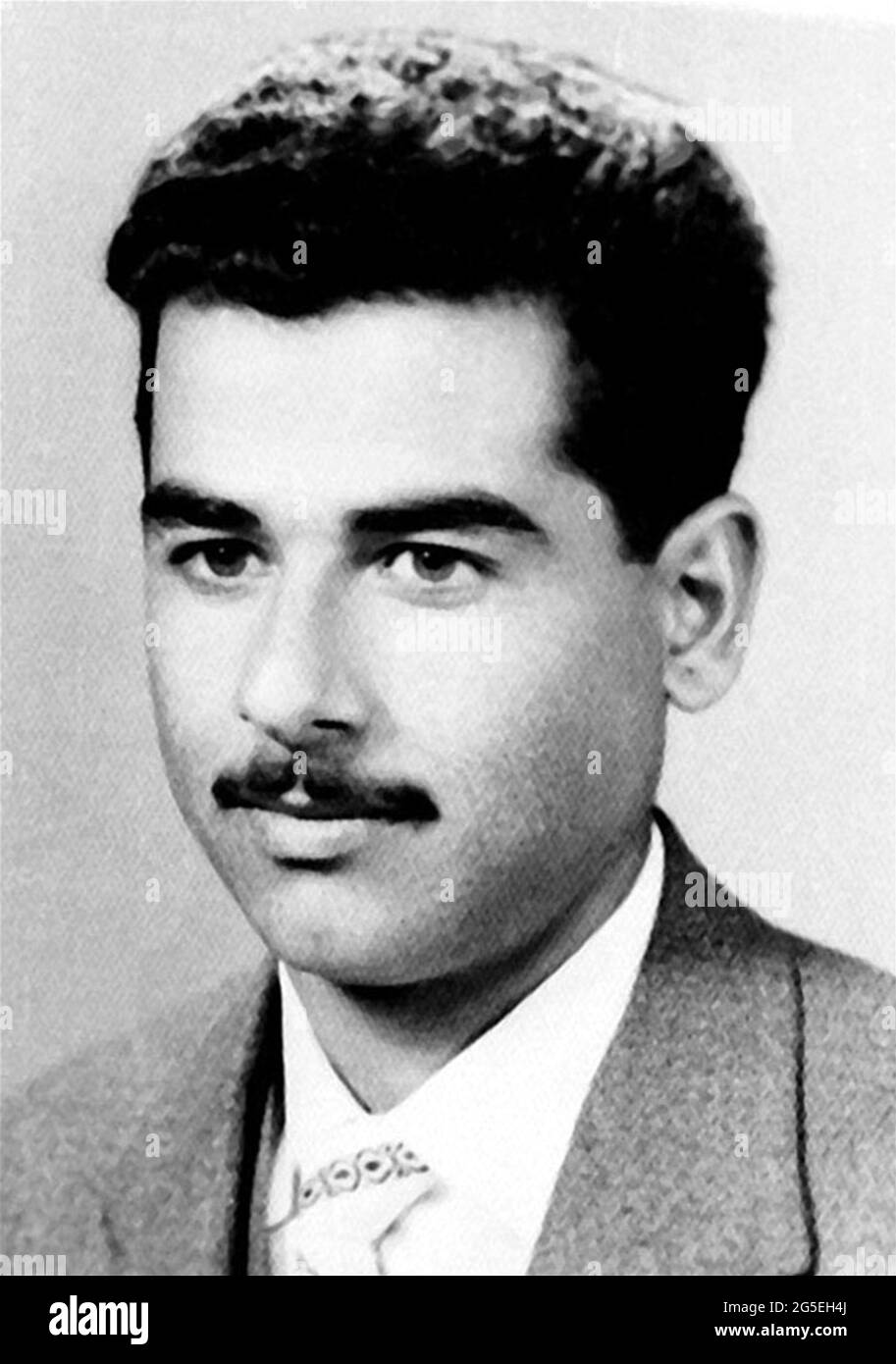 1956 c. , Bagdad , IRAQ : The  Iraq politican President SADDAM HUSSEIN ( 1937 - 2006 ) when was young aged 19 . Unknown photographer .-  POLITIC - POLITICA - POLITICIAN - POLITICO -  personalità da giovane giovani - personality personalities when was young - DICTATOR - DITTATORE - DICTATOR - GUERRA DEL GOLFO - GULF WAR - baffi - moustache --- Archivio GBB Stock Photo