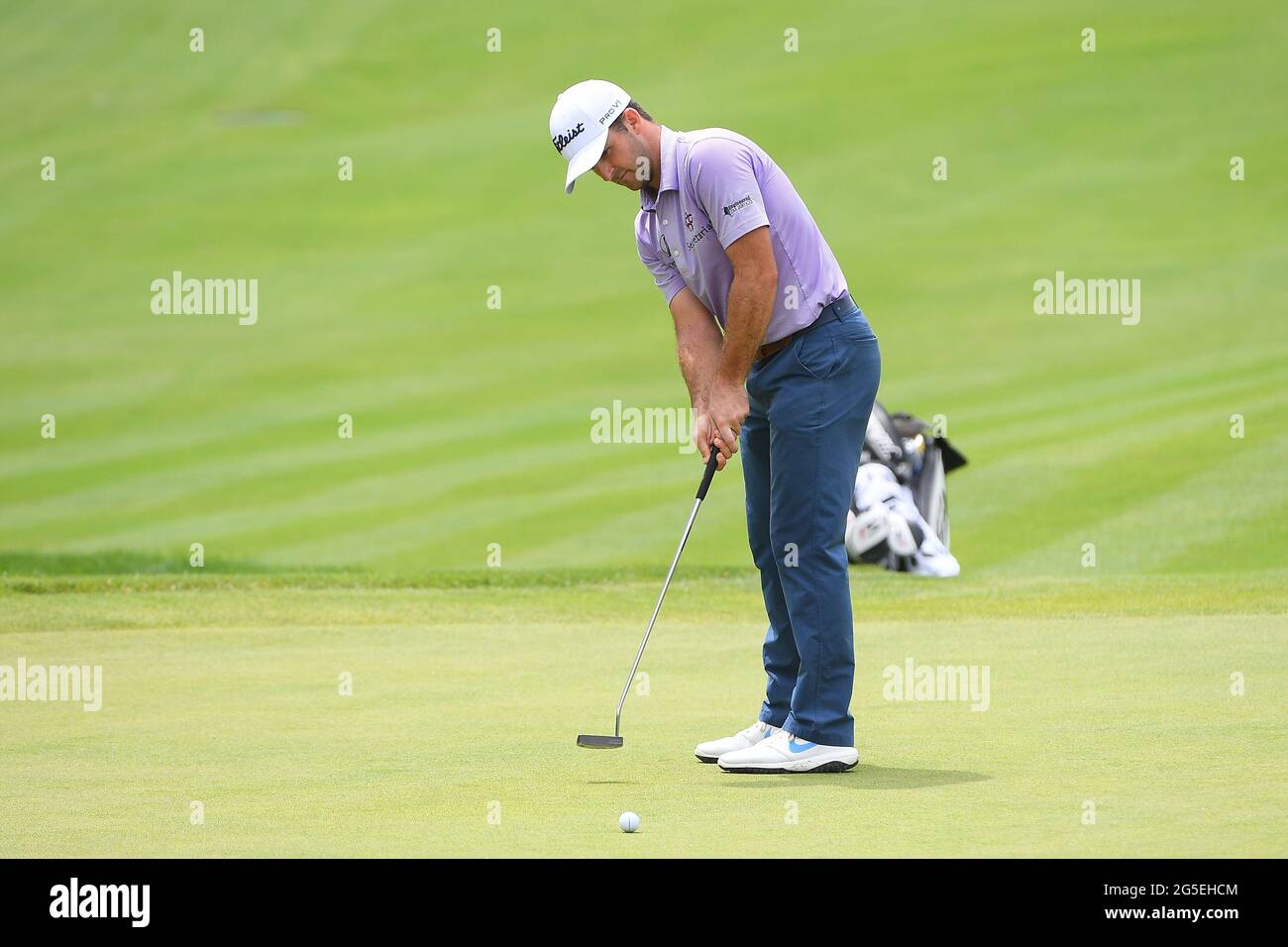Cromwell, CT, USA. 26th June, 2021. Denny McCarthy putts on the 18th