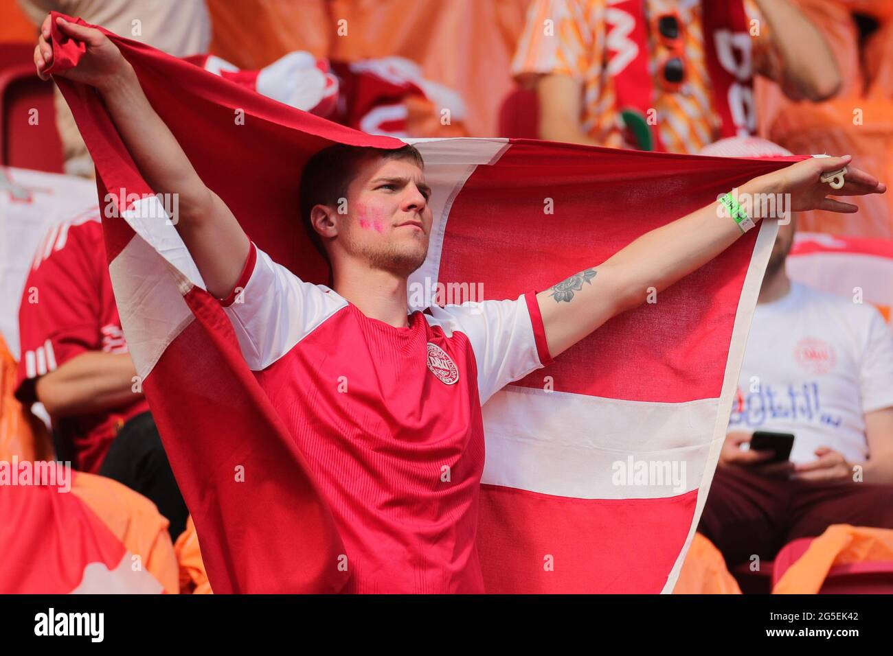 Amsterdam, Netherlands. 26th June, 2021. A Denmark fan is seen ahead of the the UEFA Euro 2020 Championship Round of 16 match between Wales and Denmark at Johan Cruijff ArenA in Amsterdam, the Netherlands, June 26, 2021. Credit: Zheng Huansong/Xinhua/Alamy Live News Stock Photo