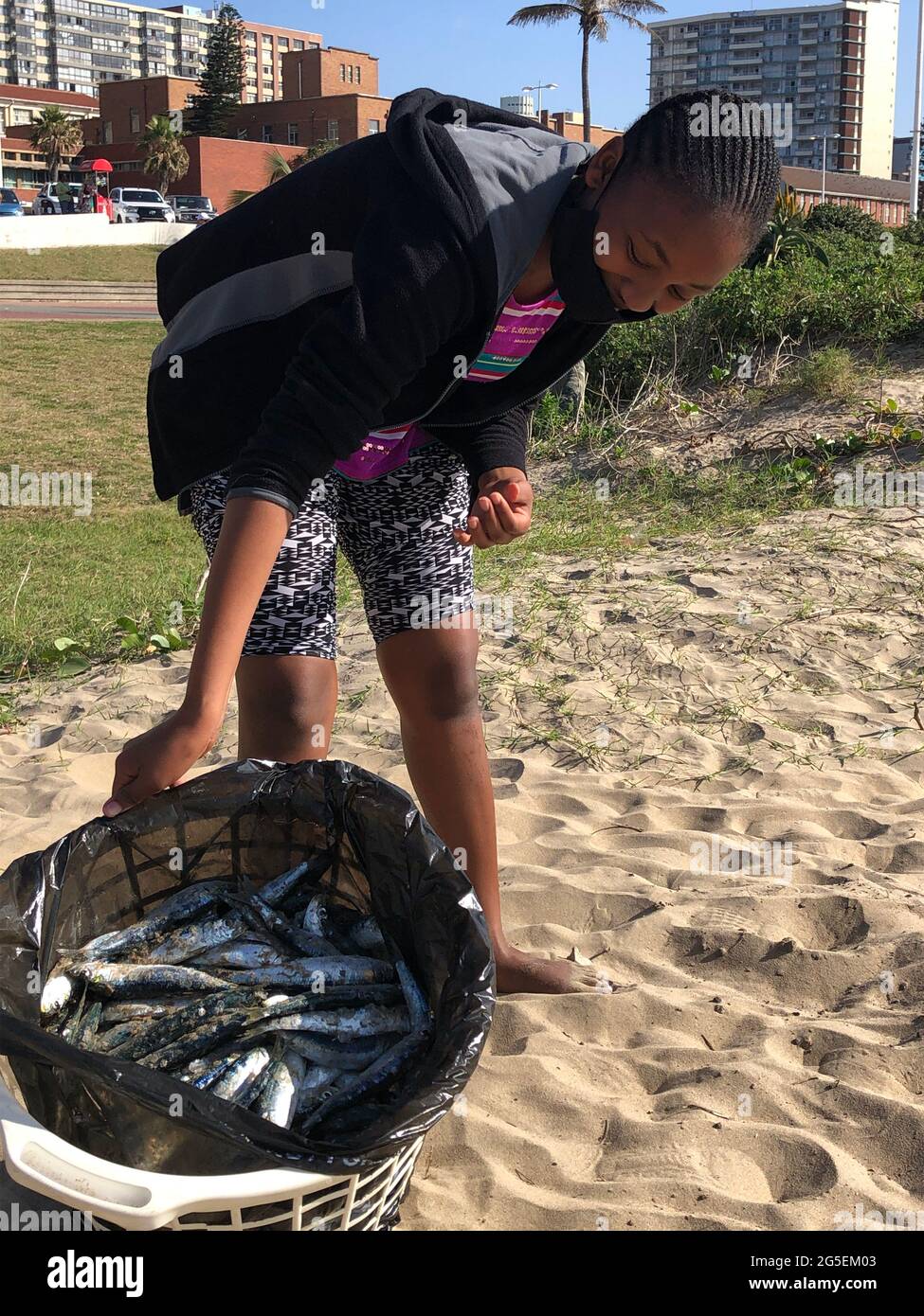 Durban, South Africa. 26th June, 2021. A young woman has bought fresh