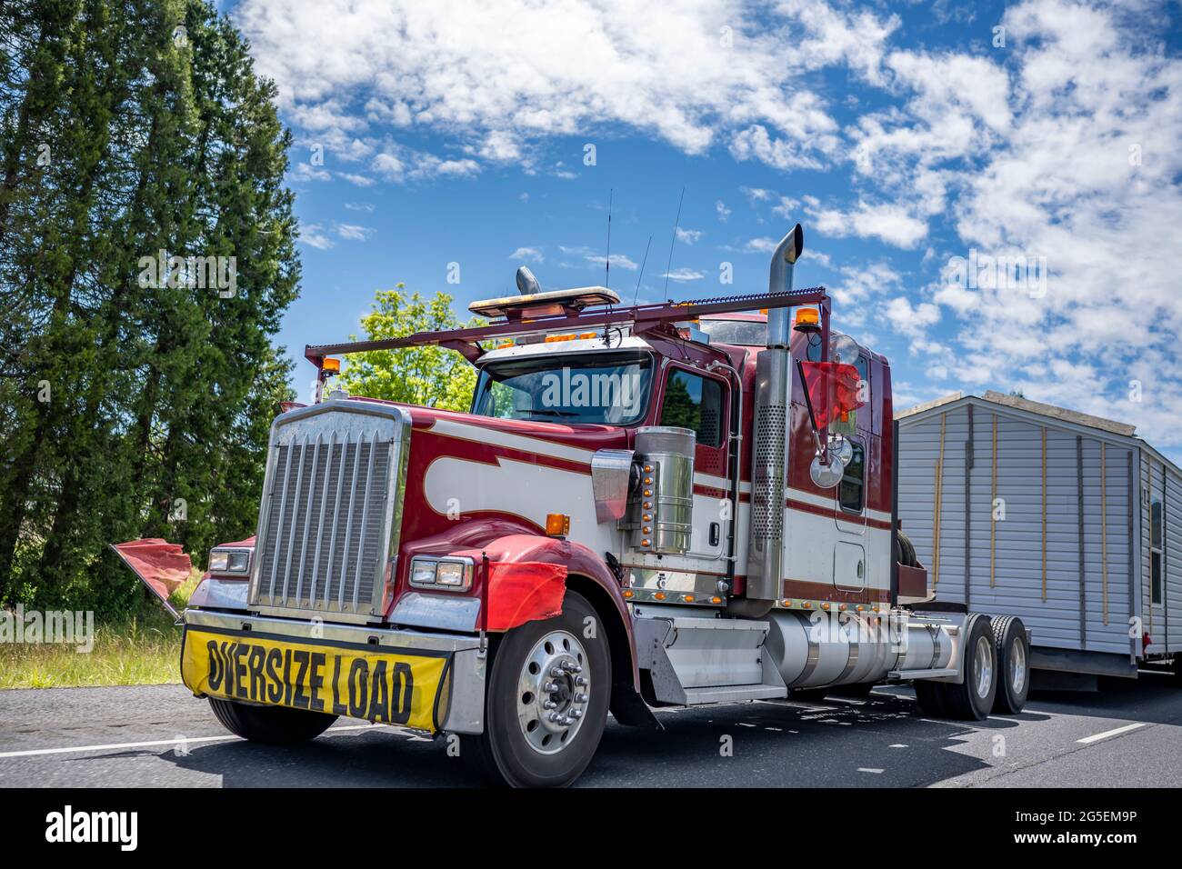 Specially equipped American idol red classic big rig semi truck with ...