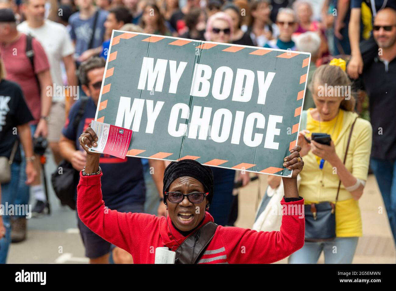 London, UK. 26th June, 2021. A woman holds a placard saying ‘My body my choice' during the Freedom March demanding an end to COVID-19 restrictions, London. (Photo by Dave Rushen/SOPA Images/Sipa USA) Credit: Sipa USA/Alamy Live News Stock Photo