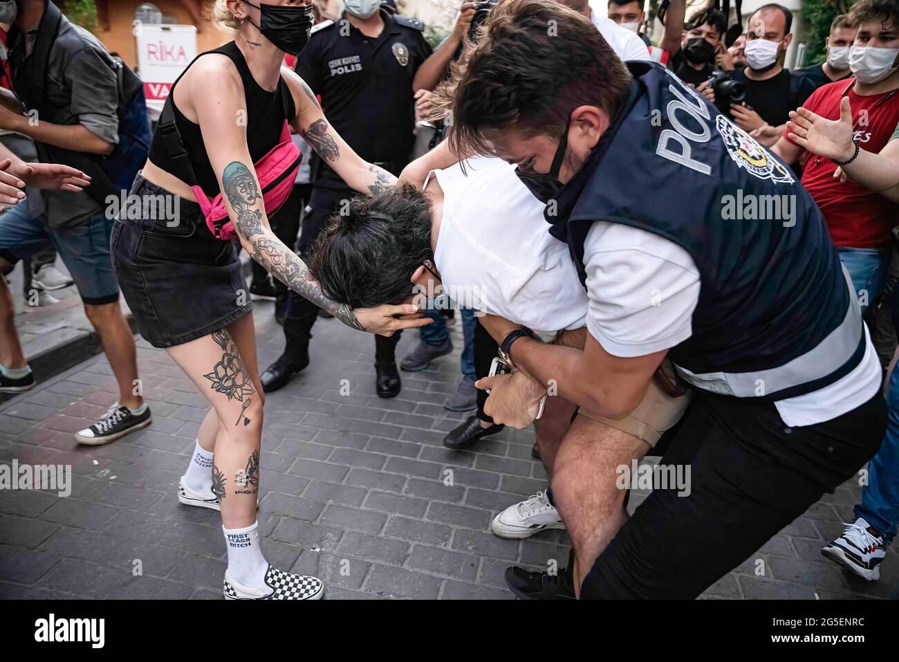 Police officers arrest a protester during the demonstration. Turkish police detained ten people who defied the ban on Pride parade, Bystanders reacting against the heavy-handed response were among the people detained. (Photo by Murat Baykara / SOPA Images/Sipa USA) Stock Photo
