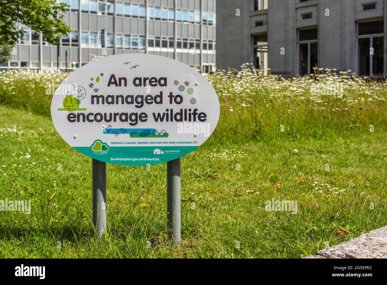 'An area managed to encourage wildlife' sign in the city centre of