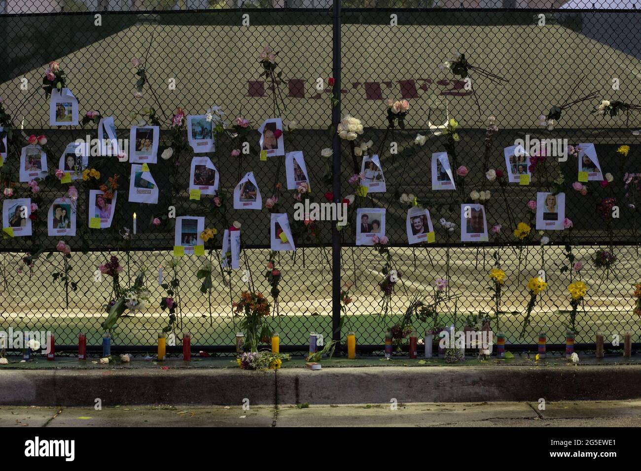 Washington, USA. 26th June, 2021. A makeshift memorial is seen near the site of the residential building collapse in Miami-Dade County, Florida, the United States, on June 26, 2021. The death toll from the partial collapse of a 12-story residential building has risen to five while the number of missing people rose to at least 159, local media reported on Saturday. Credit: Monica McGivern/Xinhua/Alamy Live News Stock Photo