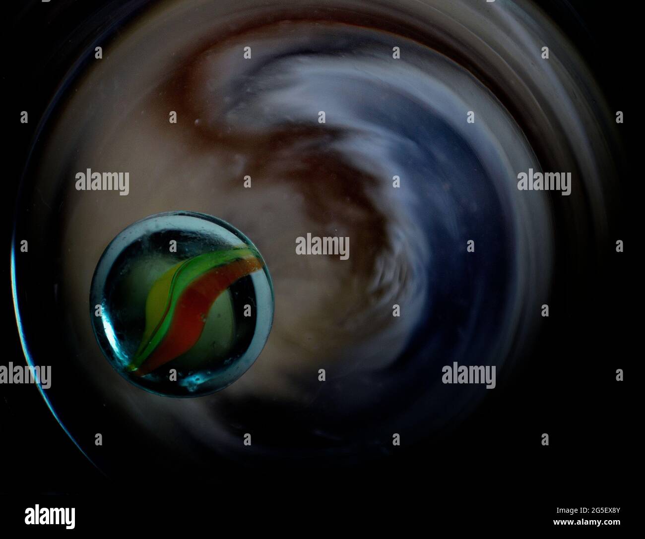 Glass clicker in a glass of water Stock Photo Alamy