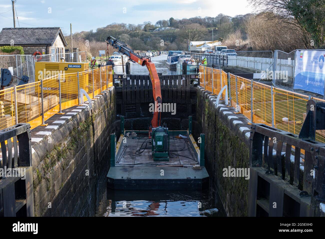 Engineering works by the Canal and River trust replacing lock gates on the Leeds Liverpool canal Stock Photo