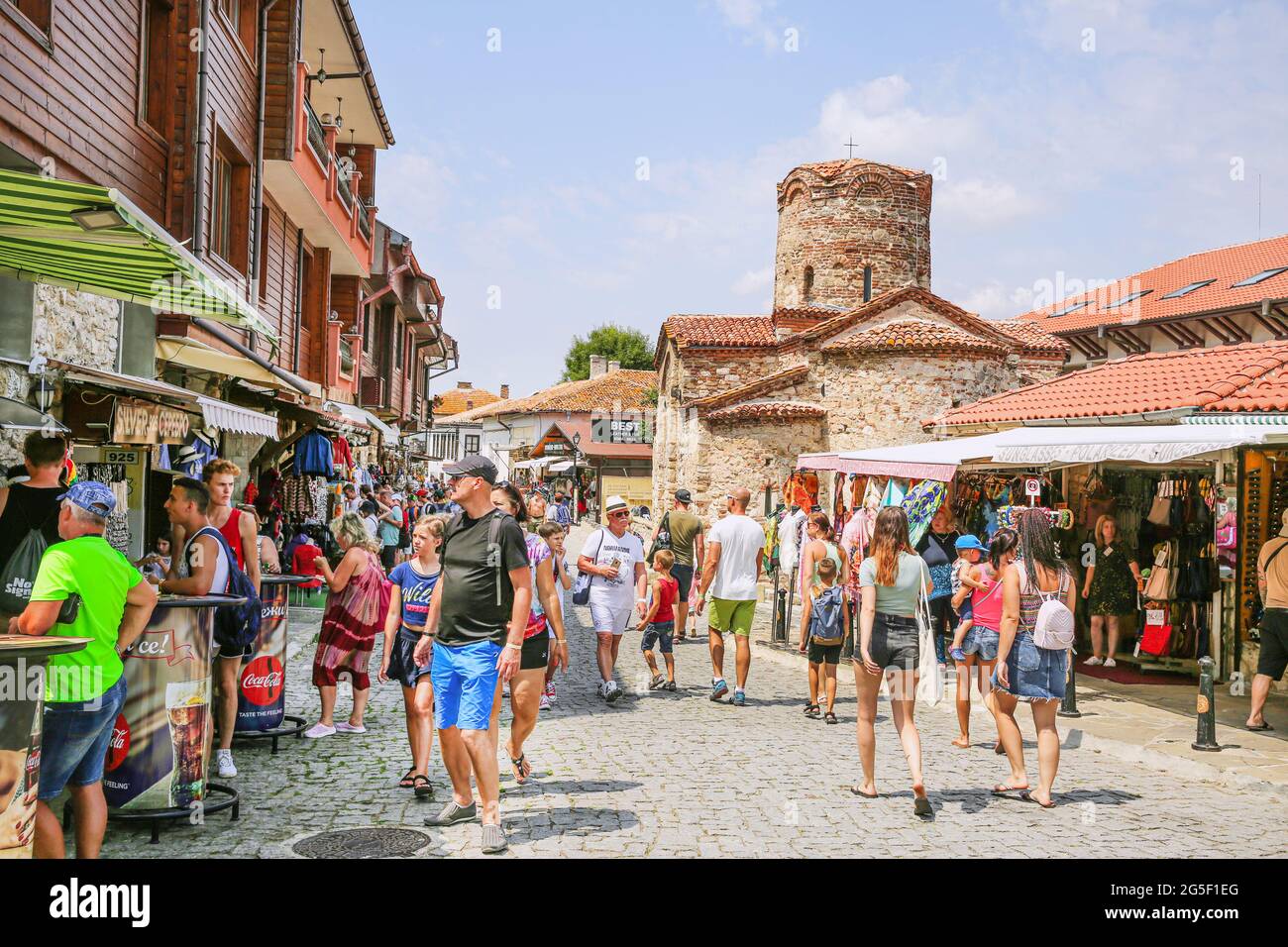 29 of July 2019, Nessebar Bulgaria. Nesebar old town, local market with souvenir, traditional clothers and church. Stock Photo
