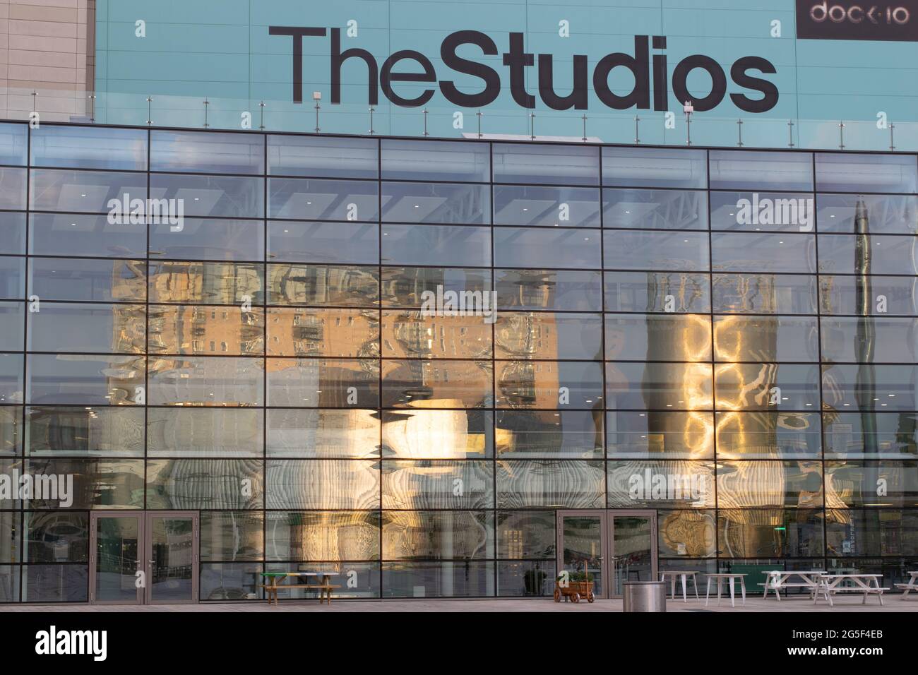 The Studios Media City, Salford Quays BBC with reflection of Lowry Theatre in glass. Manchester, UK Stock Photo