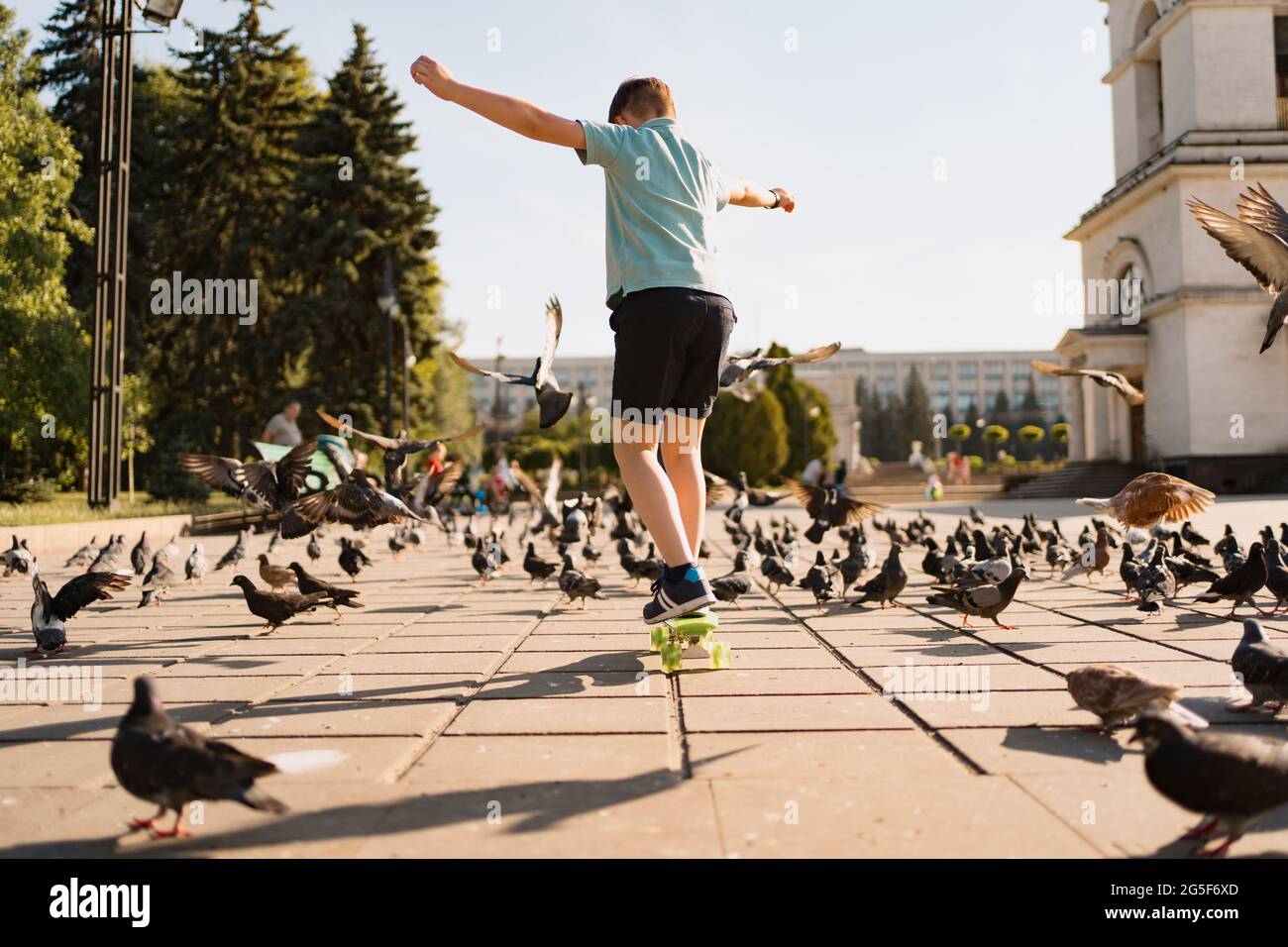 Riding penny board hi-res stock photography and images - Alamy
