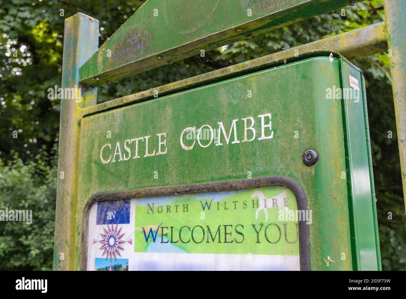 Name sign at Castle Combe car park, a picturesque village in the Cotswolds Area of Natural Beauty in Wiltshire, south-west England Stock Photo