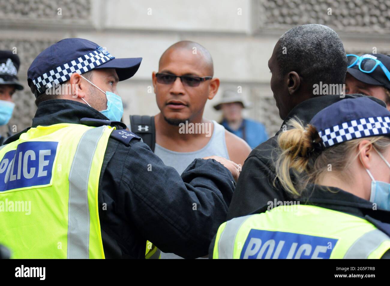London, UK. 26th June, 2021. Anti lockdown protest on Parliament Square. Credit: JOHNNY ARMSTEAD/Alamy Live News Stock Photo