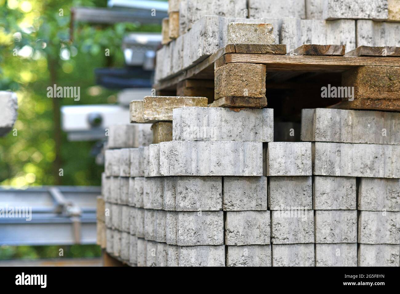 Cobble stones on palette at construction site Stock Photo