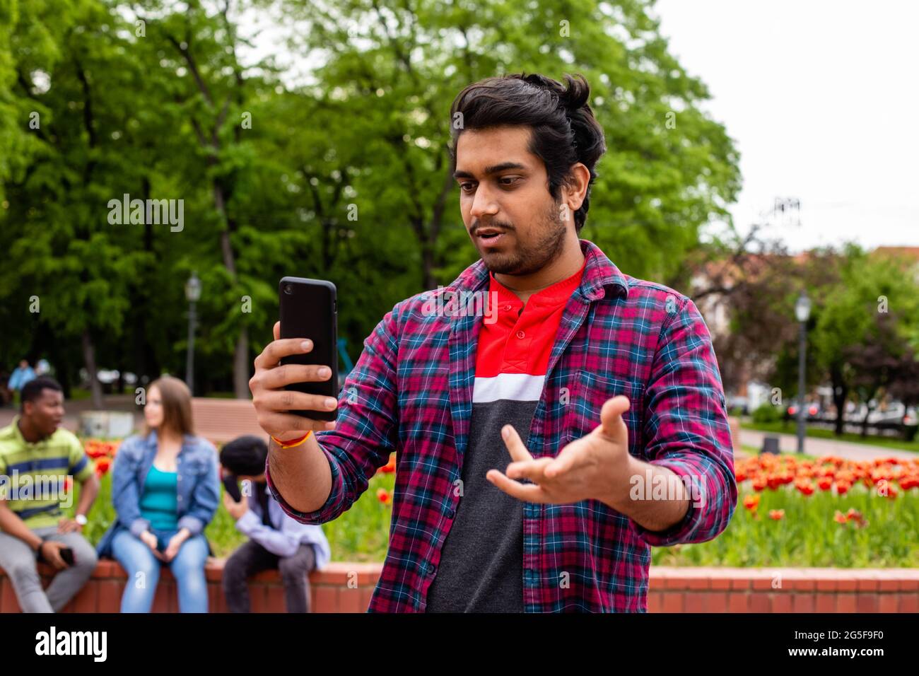 Student having online call with his family Stock Photo