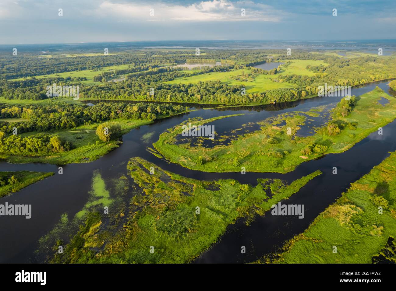 River Volga with islands, branch, girt with fishing boats and camps ...