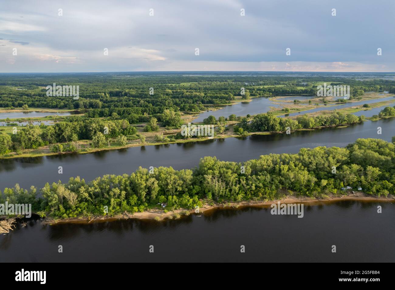River Volga with islands, branch, girt with fishing boats and camps, aerial view Stock Photo