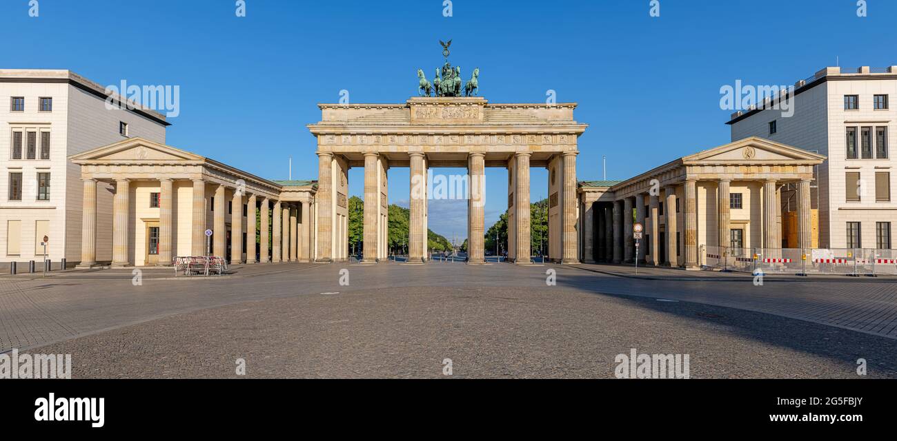 Panorama of the famous Brandenburg Gate in Berlin early in the morning with no people Stock Photo