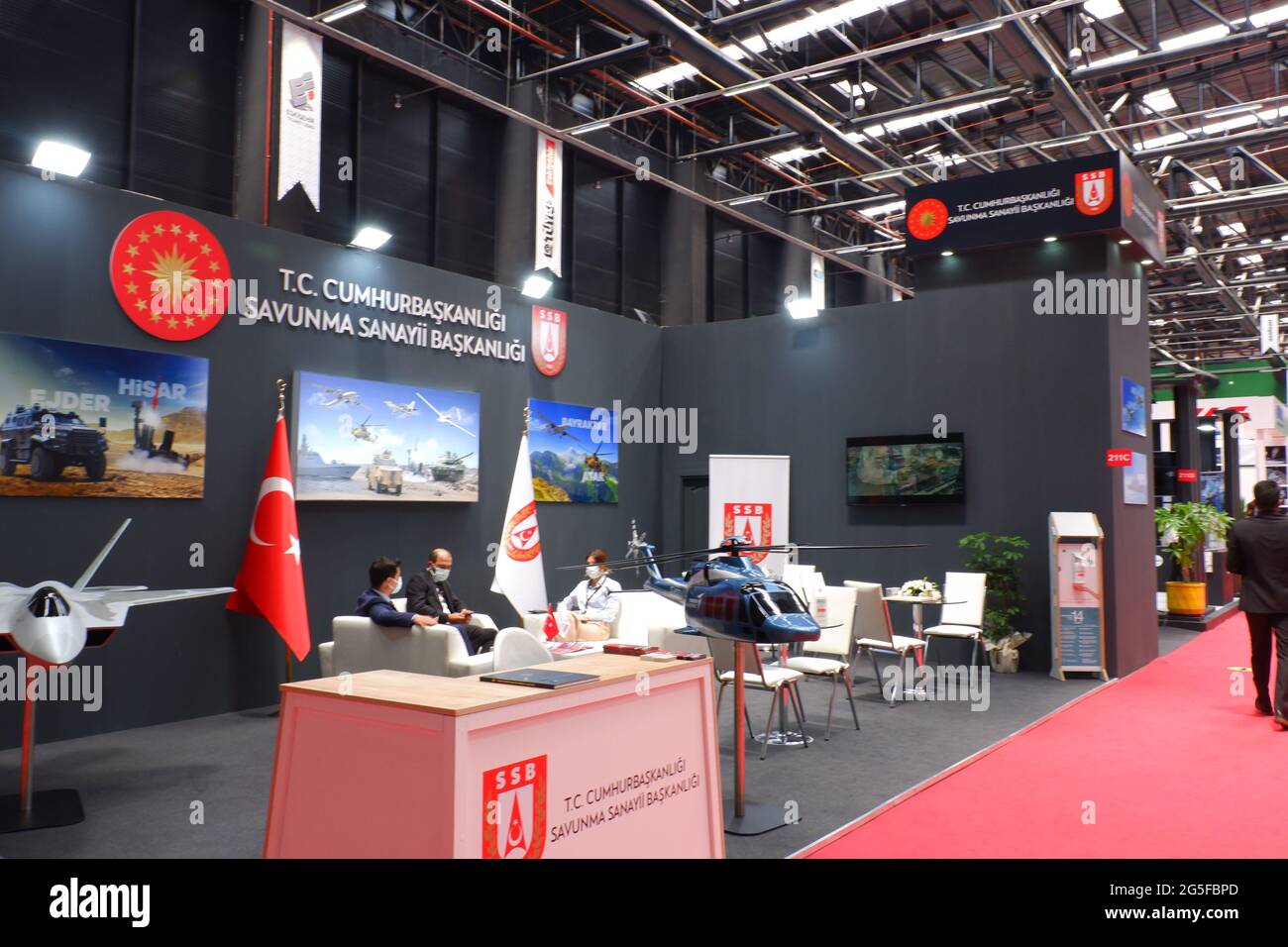 Gallery of Turkish Defense Ministry at Industrial Fair in Eskisehir Turkey with national helicopter and fighter jet models Stock Photo