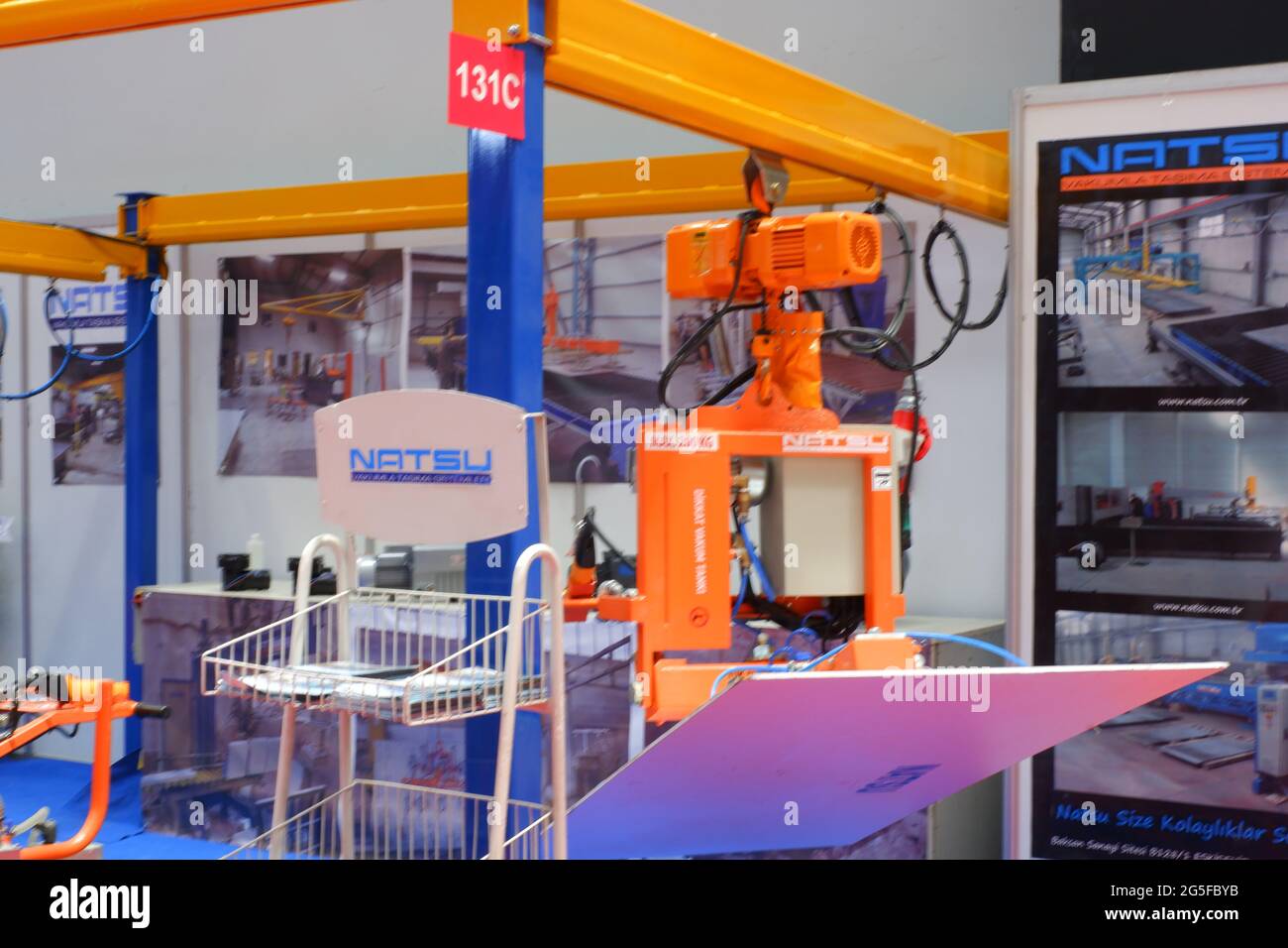 Vacuum Robotic Hands at Industrial Exhibition Stock Photo