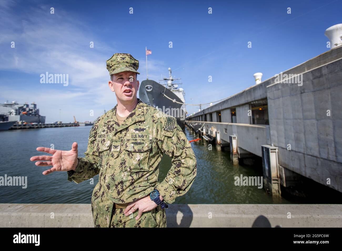 The Naval Station in Norfolk is threatened by seawater both from rising sea levels and sinking land mass. The Navy is not waiting for politicians to agree on whether climate change is real or not. Stock Photo