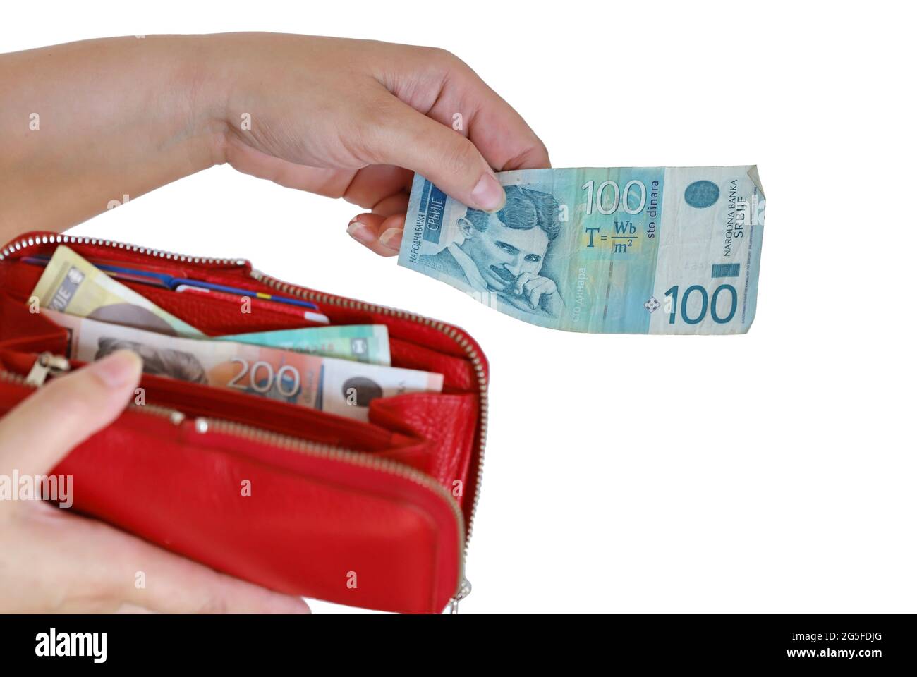 Hand holding a wallet with money, serbian dinar Stock Photo