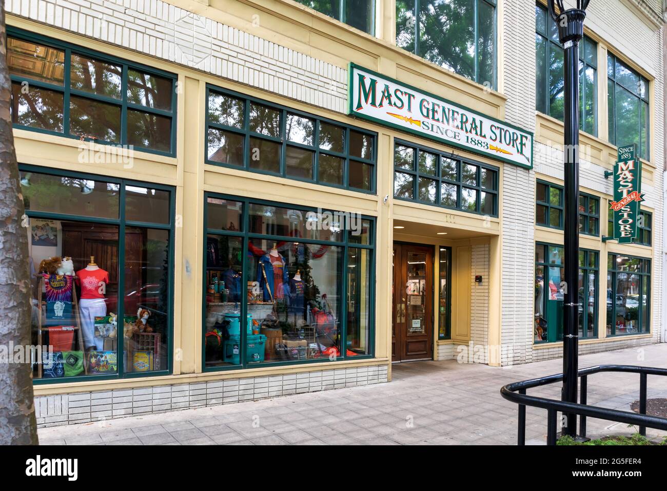 GREENVILLE, SC, USA-23 JUNE 2021: The Mast General Store on Main St. in downtown, showing diagonal front view, windows, sign, sidewalk. Stock Photo