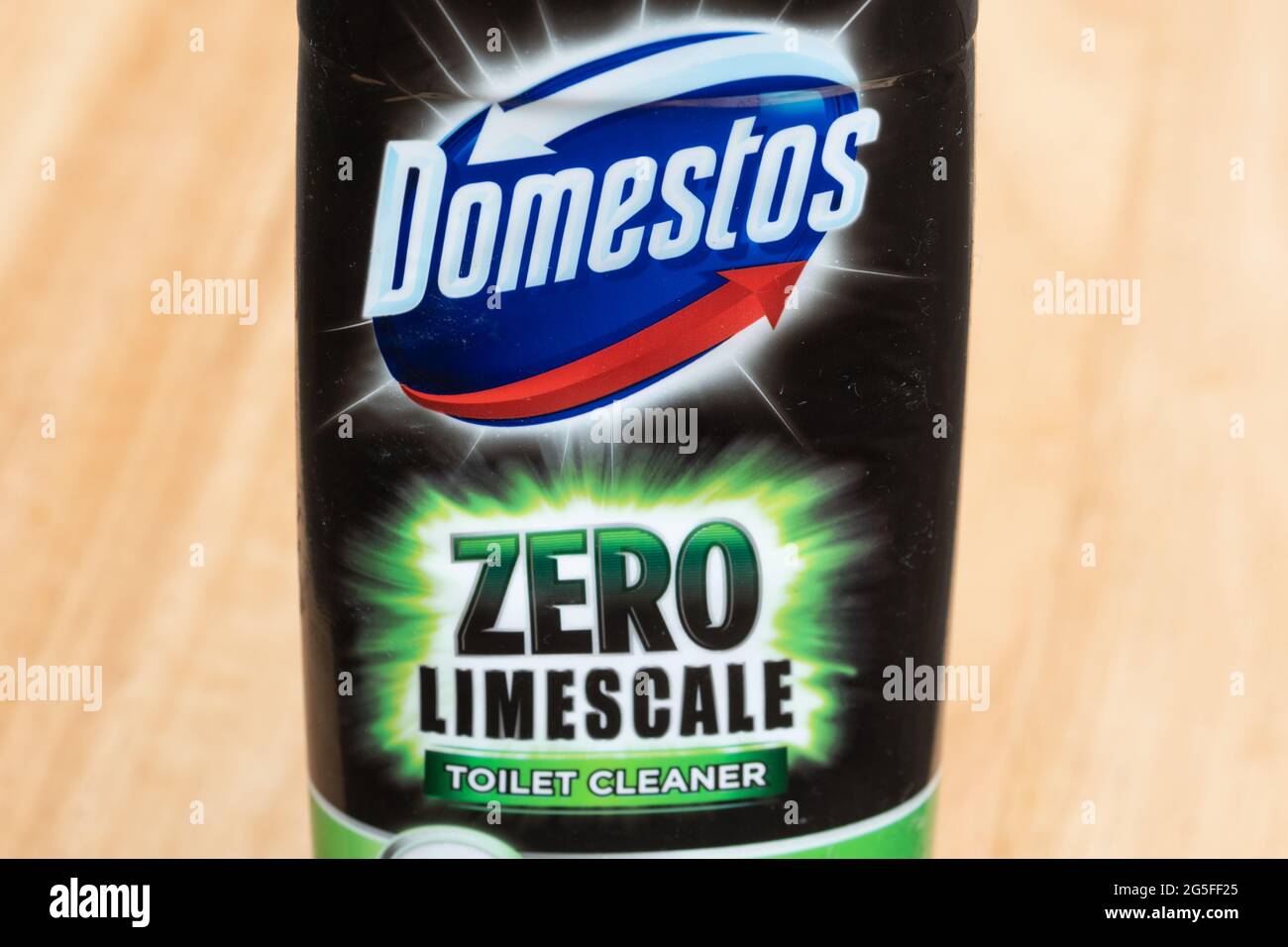 Bottle of Domestos zero limescale bleach, cleaning product in black bottle Stock Photo
