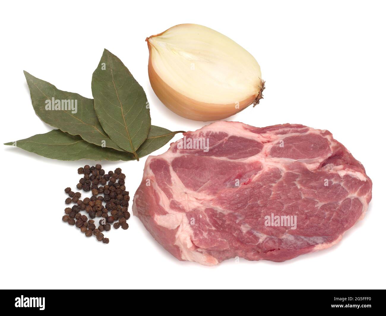 Raw pork neck meat cut with black pepper, onion and bay leaves on white background Stock Photo