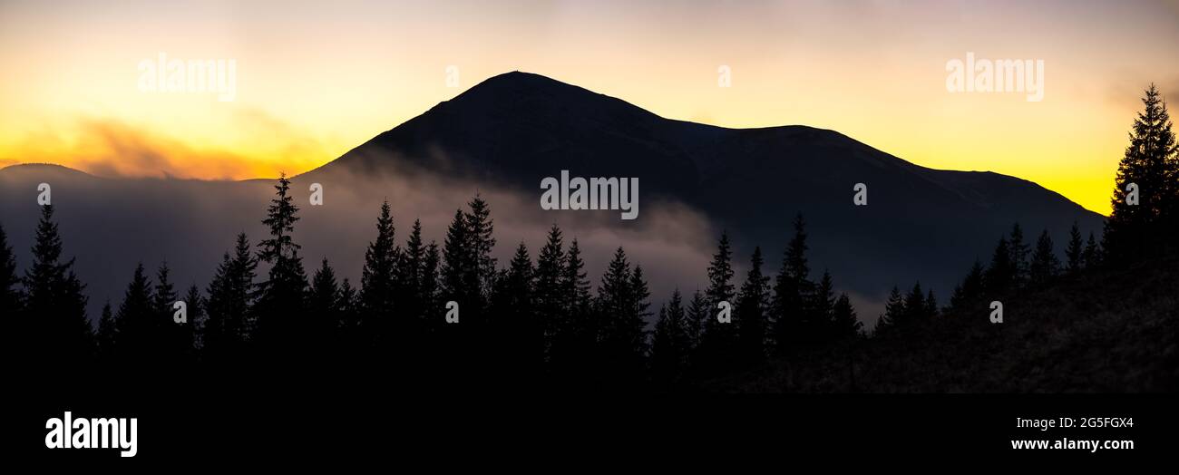Beautiful mountain panorama of landscape with hazy peaks and foggy ...