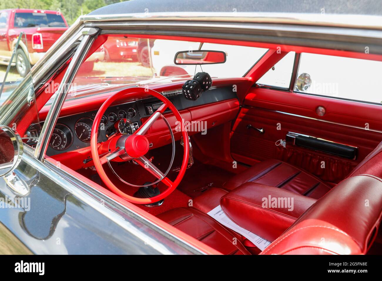 Königs Wusterhausen, Germany. 27th June 2021.  The interior of a Dodge Charger R/T built in 1968 at the classic car parade 'Rummblubbern' in and around Königs Wusterhausen. More than 400 American vehicles are expected to take part in the two-hour motorcade. The route of the motorcade will be about 40 km long. The organizers expect thousands of guests along the route and in the restaurants. Photo: Gerald Matzka/dpa Credit: dpa picture alliance/Alamy Live News Stock Photo